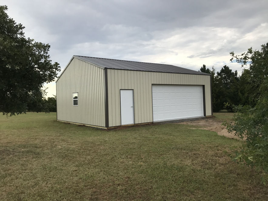 24 feet by 32 feet by ten feet pole building with steel siding and roofing haven kansas