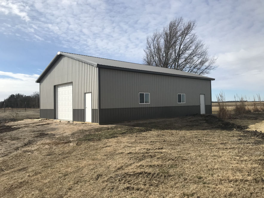 24 feet by 32 feet by ten feet pole building with steel siding and roofing haven kansas
